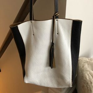 Roots leather bag